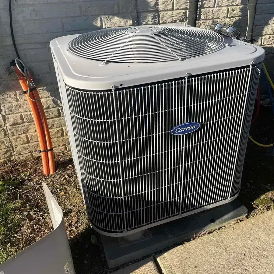 Outdoor air conditioning unit inspection and maintenance by Loving Air in Fredericksburg VA